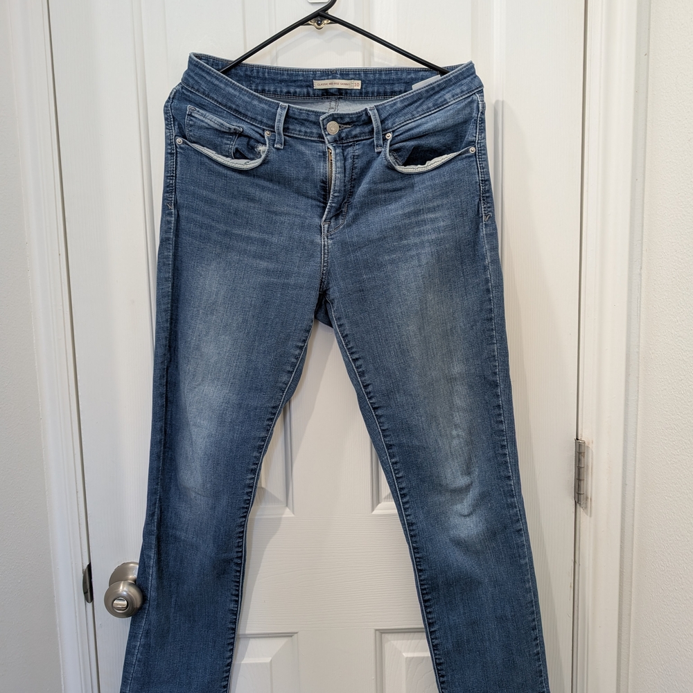 Medium Wash Straight Leg Jeans with Subtle Fading